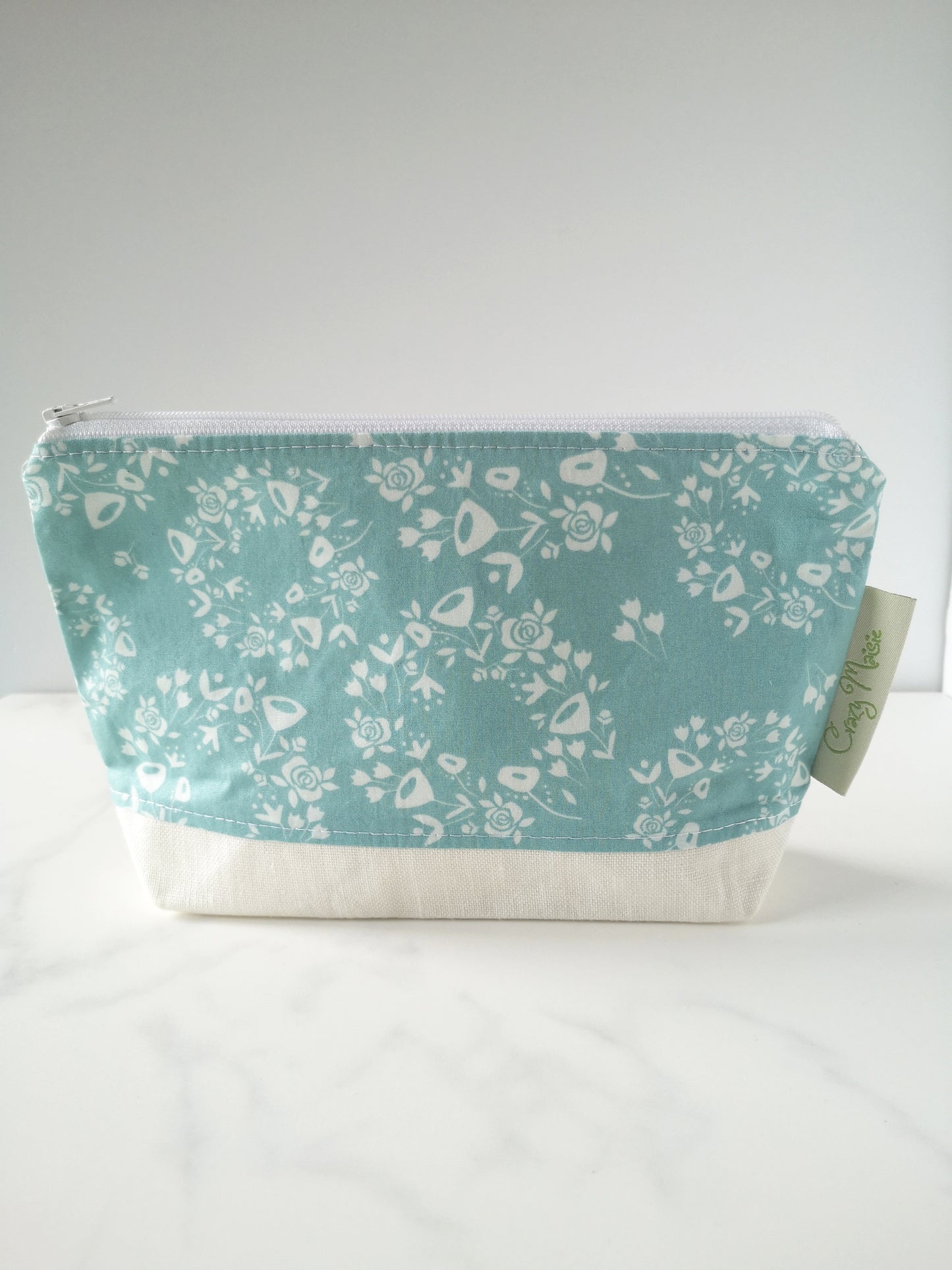 Blue and white floral makeup bag